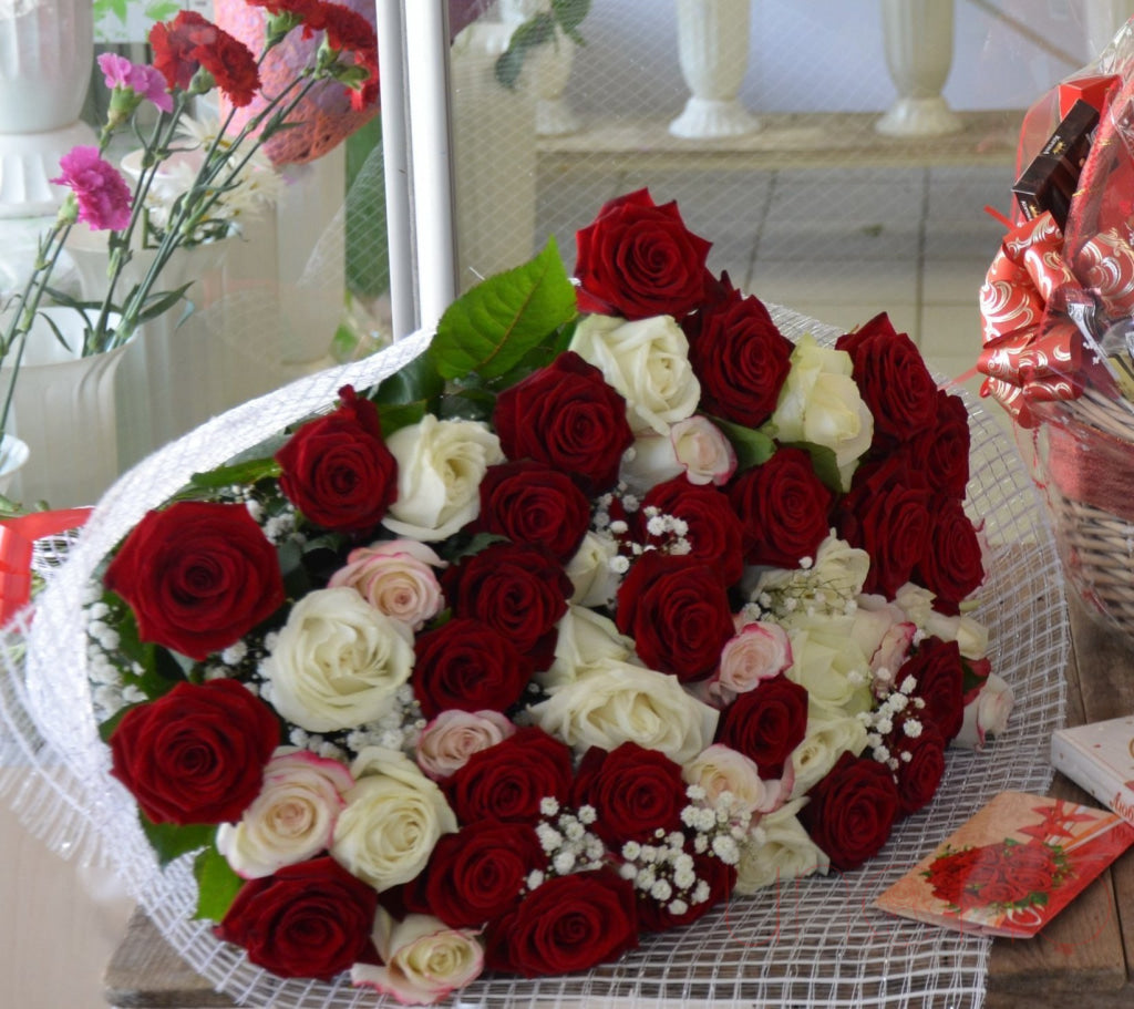 Marvelous Red and White Roses Bouquet | Ukraine Gift Delivery.